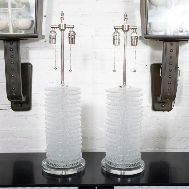 Pair of stacked Murano glass disk lamps.