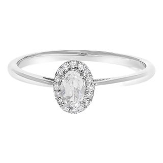 10K White Gold 5X3MM Oval White Topaz and Diamond Accent Halo Ring (I-J Color, I1-I2 Clarity) - Ring Size 5 For Sale