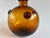 Mid-century Italian blown glass bottle in chic amber with matching stopper.