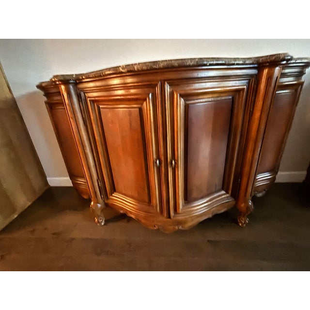 Add timeless charm to your space with this beautifully crafted cherrywood cabinet. Featuring a gracefully curved front and...