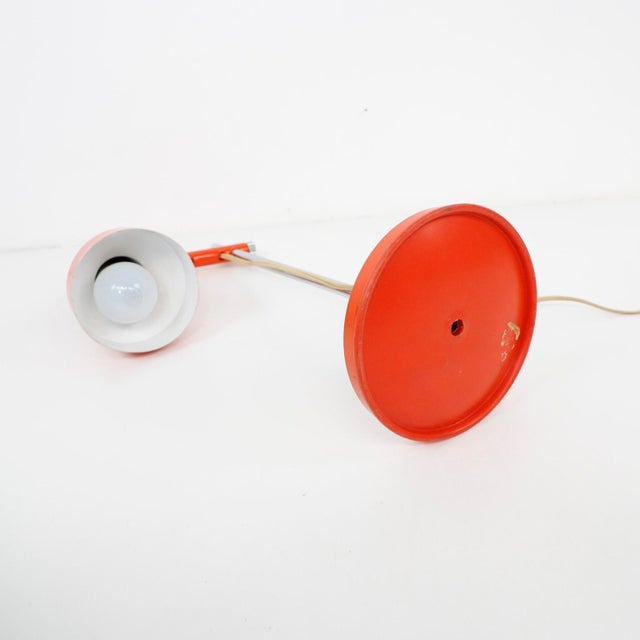 circa 1970. We offer this desk lamp made in Mexico in metal and orange color.