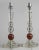 Pair French Art Deco glass lamps with hexagonal shape at top, above two clear glass balls, above an octagonal connector,...
