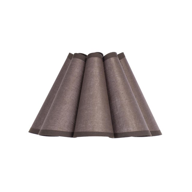 Crafted from linen in a rich Umber hue, the Polly Alternate Shade features a gently scalloped form that adds quiet...