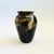 A beautiful vintage studio pottery vase finished in moody overlapping gray, brown, and black glazes. Signed on the base....