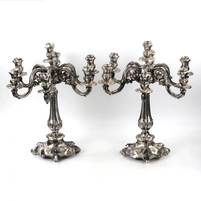 A pair of Vercelli silver candelabra, 800 standard silver, 7 candles each. H-50 cm. The turn of the 19-20 centuries. Made...