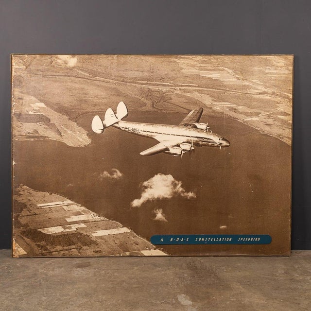 A striking 20th century photograph mounted on board, depicting a boac lockheed constellation “speedbird” aircraft,...