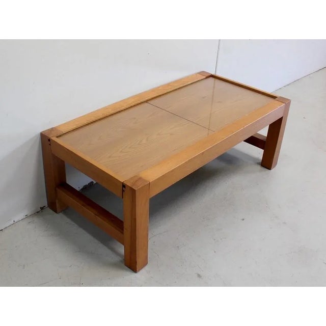 Coffee Table Ash Convertible range at the Design resolutely contemporary. Dated 1970, it has an embedded glass tray and...