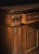 Handcrafted in Italy from solid walnut, this sideboard features a hand-carved design with raised panel doors, carved...