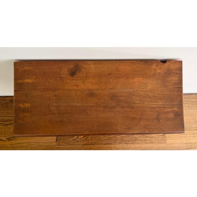 Diamond Dyes The Governess countertop advertising cabinet, circa 1910. Embossed tin-lithograph front panel above an oak...