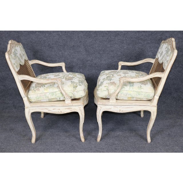 Pair Louis XV Style French Cream Distressed Painted Cane Back Armchairs For Sale - Image 4 of 16