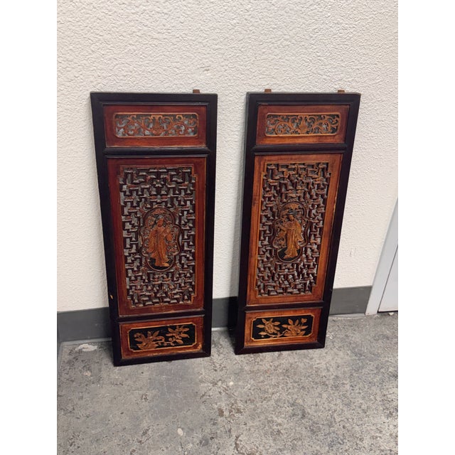 Design Plus Gallery presents a pair of Antique Carved Wood Window Panels. Each wall panel shows openwork lattice carving...