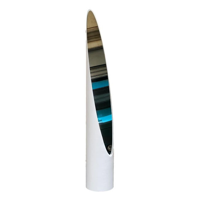 "Unghia" mirror (also known as the Oasi or Lipstick model), one of the most iconic and brilliant pieces in the 1970s. The...