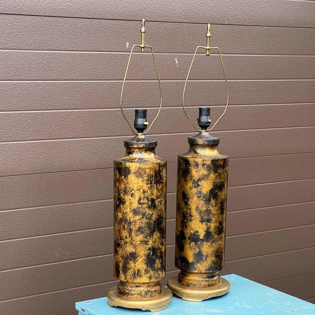 Pair of metal table lamps on wood bases with distinctly modern bronze patchwork patination after James Mont circa 1940s to...