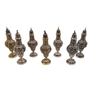 Early 20th Century Sterling Silver Hand-Chased Cherub Repousse Master Shakers With European Hallmark - Set of 7 For Sale