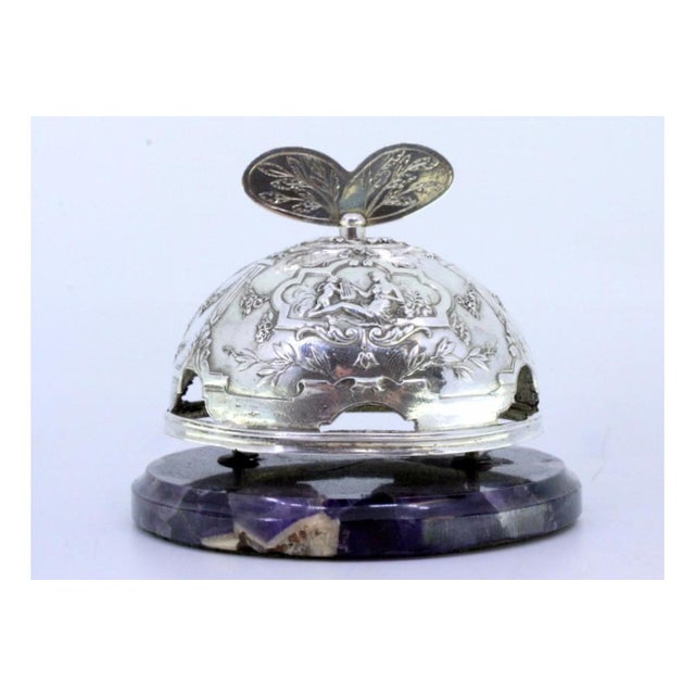 Metal Bell in Cut-Out Silver with Angelic Relief, Floral Motifs and Marble Stone Base For Sale - Image 7 of 8