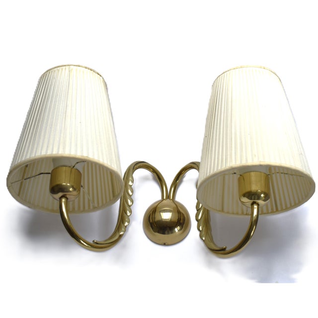 Large, two-light wall lamp in the Viennese Modernist style. The design is attributed to Josef Frank. Two E27 sockets....