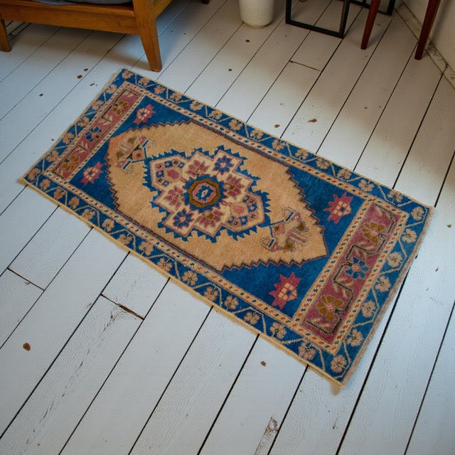 Vintage Turkish small rug from Oushak, 1960, featuring warm camel and blue tones and authentic village craftsmanship —...