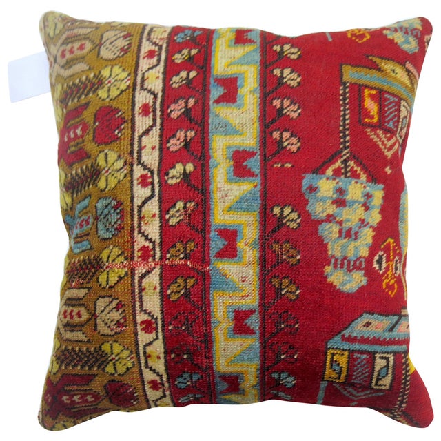 Pillow made from a colorful Turkish rug. Measures: 18" x 19".