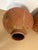 Elevate your interior with a striking, large-scale pair of authentic mid-20th-century Tarahumara (Rarámuri) rawhide-bound...