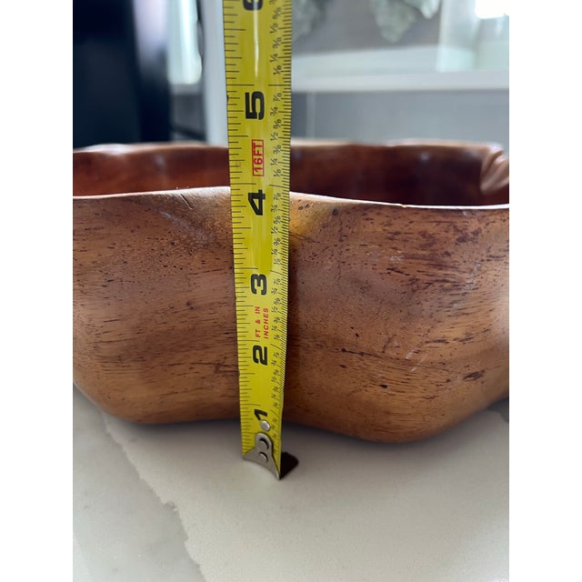 This large decorative wooden bowl was made in Hawaii in the 1970s. The richness of the monkey pod wood and the large size...