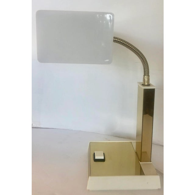 Cool gold & white desk table lamp from 70's. Good size and stylish design.Some micro pitting on base. Two small patina...