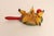 Vintage Folk Art handheld hen pecking game (ca. 1950s, Sweden). Moving the red ball attached to the paddle around in a...