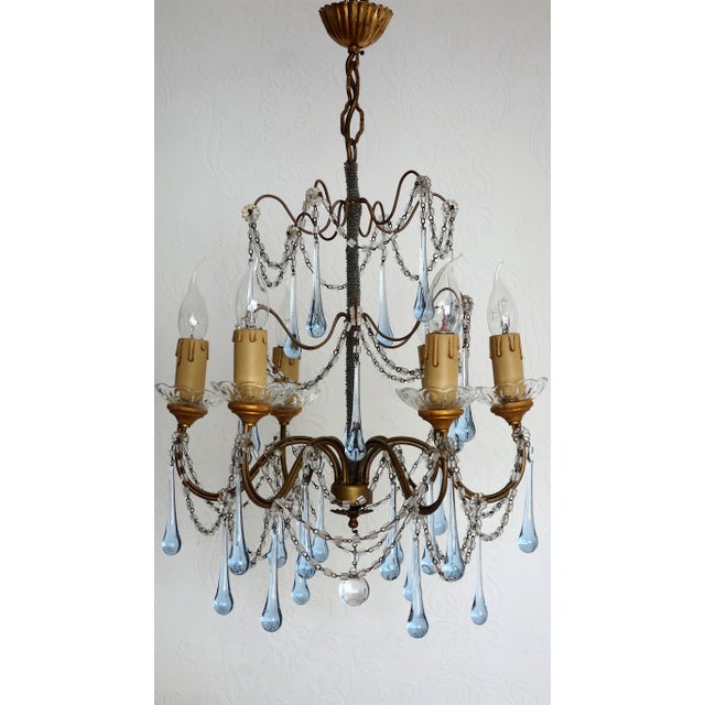 Antique Gilded Metal Murano Glass Drop Six-Light Chandelier, 1930s, in Very Good conditions. Designed 1920 to 1949 I have...