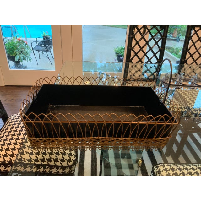 Lovely painted Metal black crackle finish container with brass surround. Loads of uses- as a cachepot for plants or...