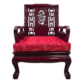 Vintage Chinese Rosewood Armchair With Hand-Carved Dragon Medallion and Red Silk Cushion For Sale