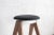 Utilizes folded metal and wood, floating top, lightweight, portable. So-named, the side profile of this stool resembles a...