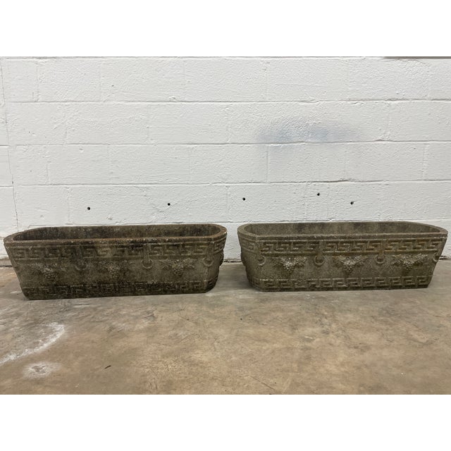 An exceptional pair of late 19th-century neoclassical garden troughs, recently rescued from a historic estate in Baton...