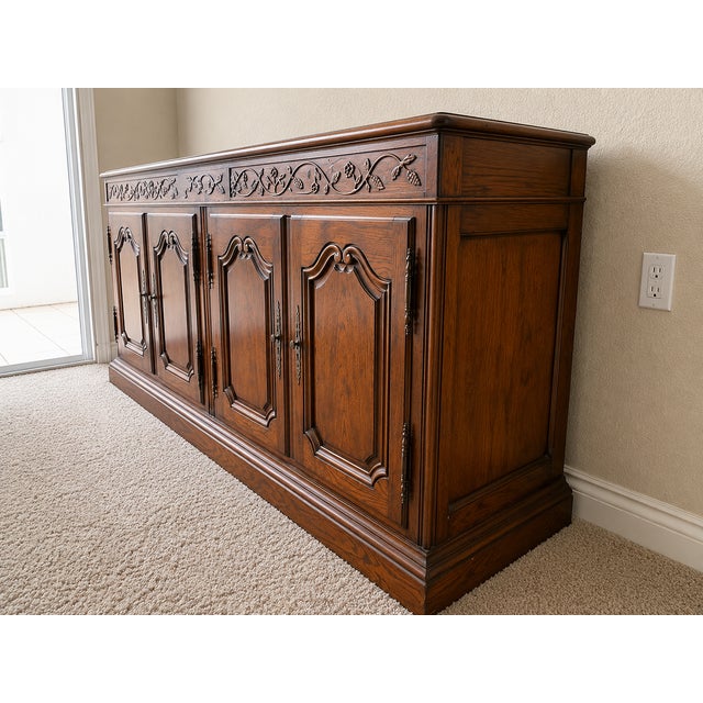 Beautiful Baker Furniture statement piece featuring carved vine-and-berry detailing, exceptional craftsmanship, and...