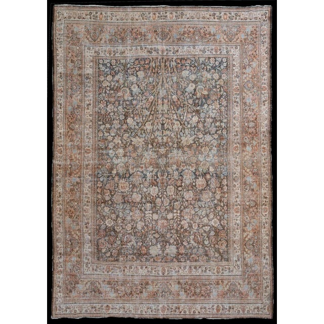An early 20th Century Persian Doroksh Rug. A true show stopper of a rug, this antique Persian Doroksh contains an...