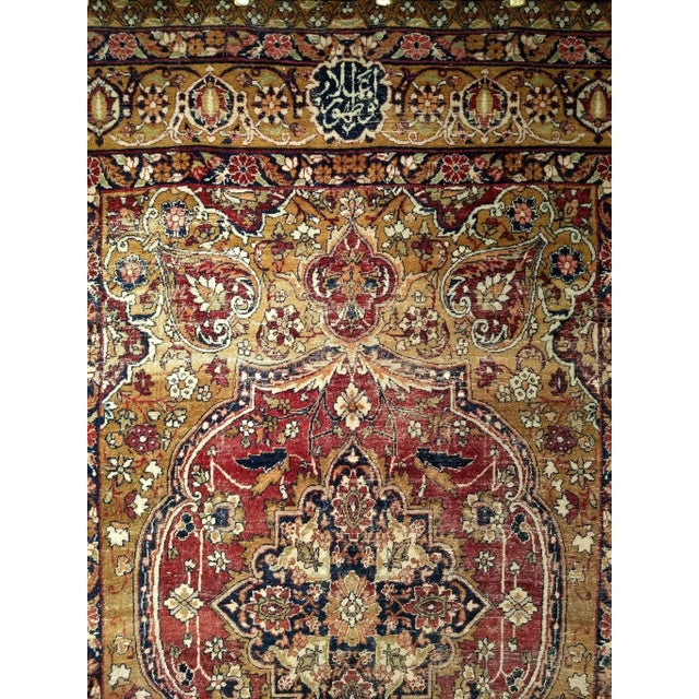 Looking at this magnificent 19th Century Persian Kerman Lavar area rug circa the 3rd quarter of the 19th century, one...