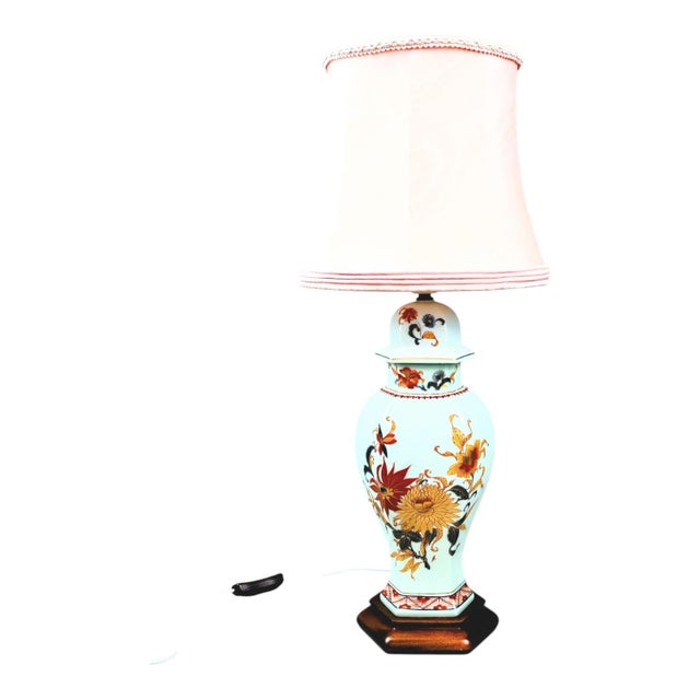 French porcelain night lamp by Limoges. The lamp is crafted from the highest quality white glazed porcelain, intricately...