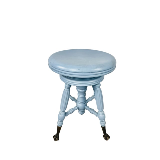 There's something wonderfully theatrical about a piano stool that spins. This late 19th-century Victorian example has been...