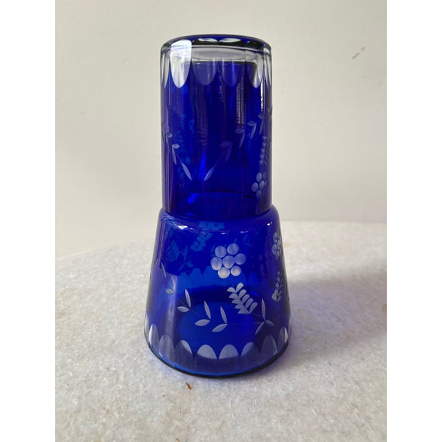 Vintage Bohemian cobalt blue cut-to-clear glass bedside water carafe and tumbler set.