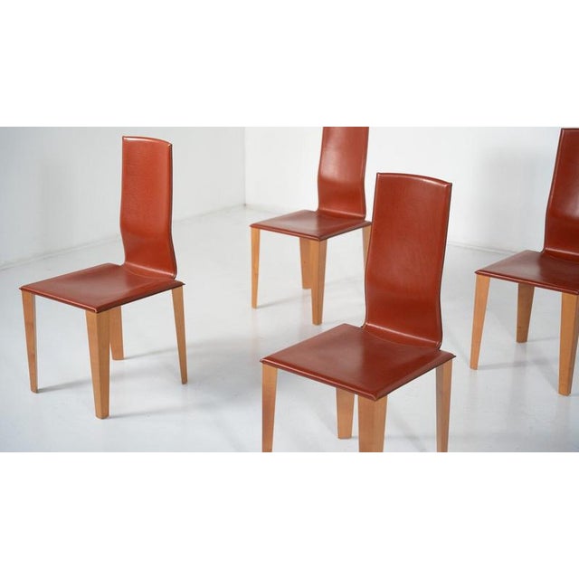 Set of 6 Dining Chairs by Afra and Tobia Scarpa, Leather and Wood, Italy This piece is attributed to the mentioned...