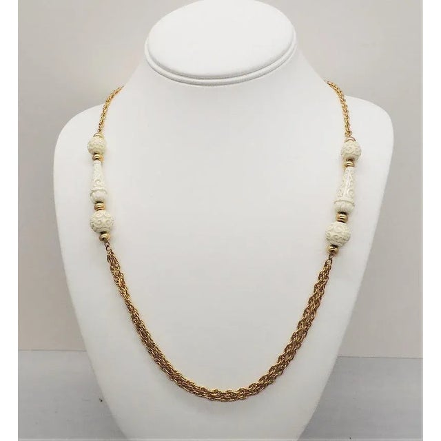 Vintage 1970s Signed Crown Trifari Carved Faux-Ivory Sautoir Necklace For Sale In Philadelphia - Image 6 of 9