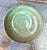 This vintage handcrafted stoneware bowl is a beautiful example of studio pottery, combining organic form with a richly...