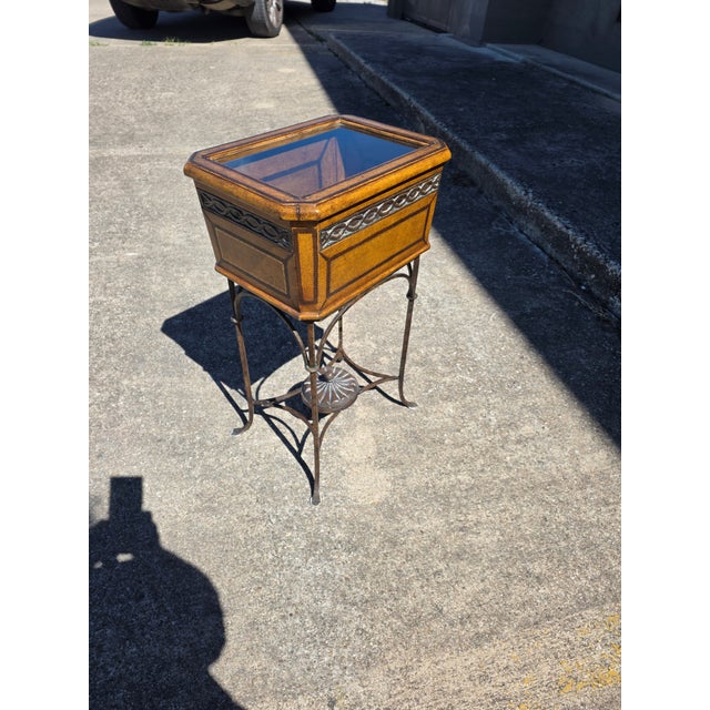 Great end table with an iron base, and leather and glass Vitrine Display case box top the top section interiordisplayarea...