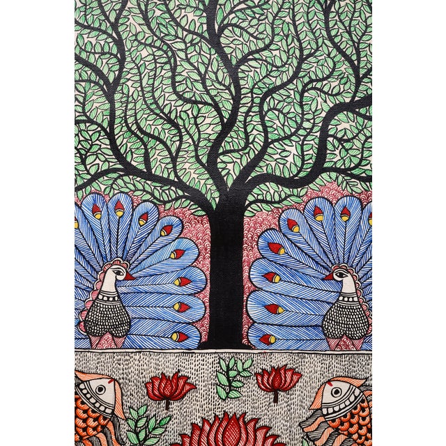 Celebrate the beauty of traditional Indian folk art with this exquisite hand-painted Madhubani painting by Mamta Devi,...