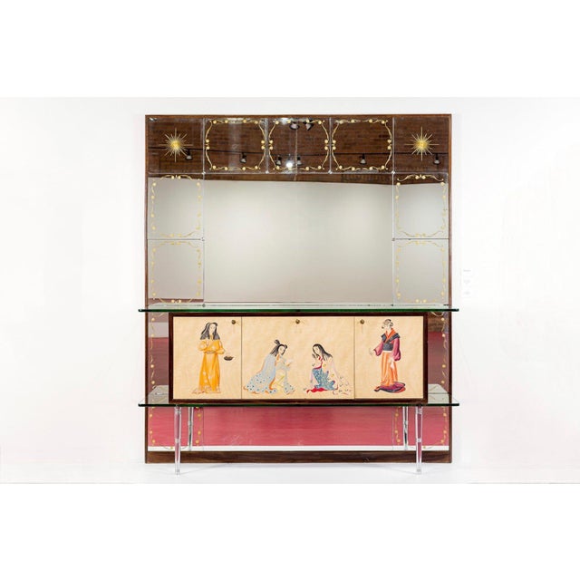 This exceptional vintage mid century modern Gio Ponti or Paolo Buffa style credenza or sideboard bar cabinet with mirrored...