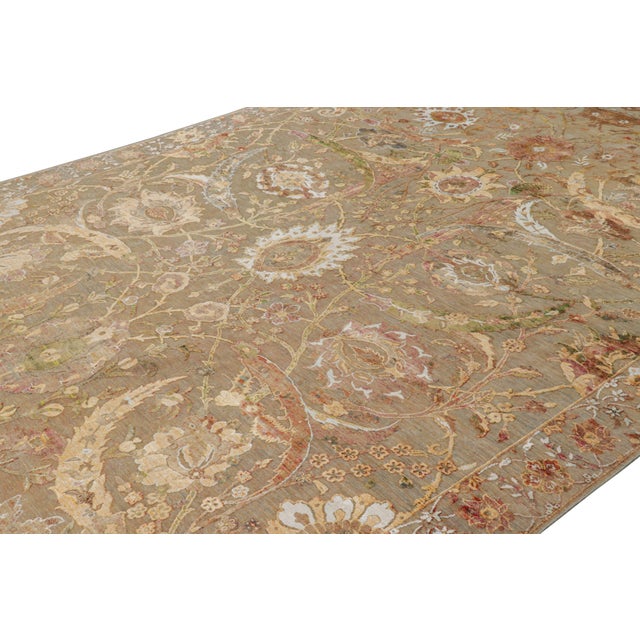 Hand-knotted in a luxurious blend of wool and silk, this 10x14 rug is from our Modern Classics collection and is...