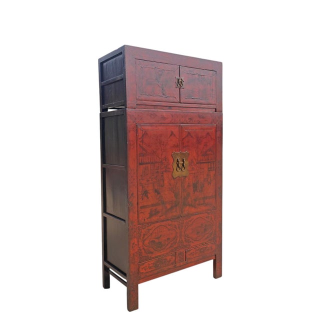 Dating to circa 1846, this tall antique Chinese cabinet is an impressive example of 19th-century Chinoiserie-style...