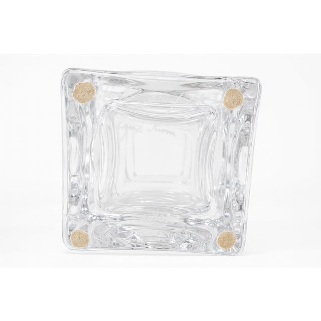 Designed for Royal Krona, this lead crystal vase by Bengt Edenfalk features bold circular reliefs that refract light with...