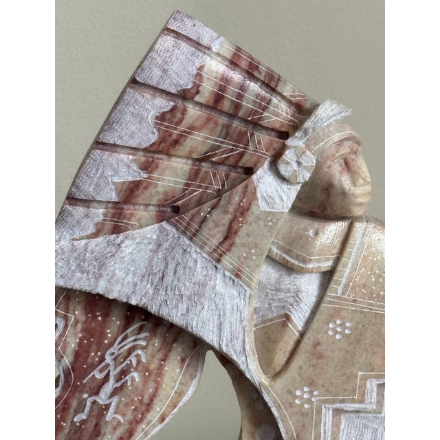 Elevate your space with this striking, vintage Southwestern fine art sculpture hand-carved by recognized Navajo (Diné)...