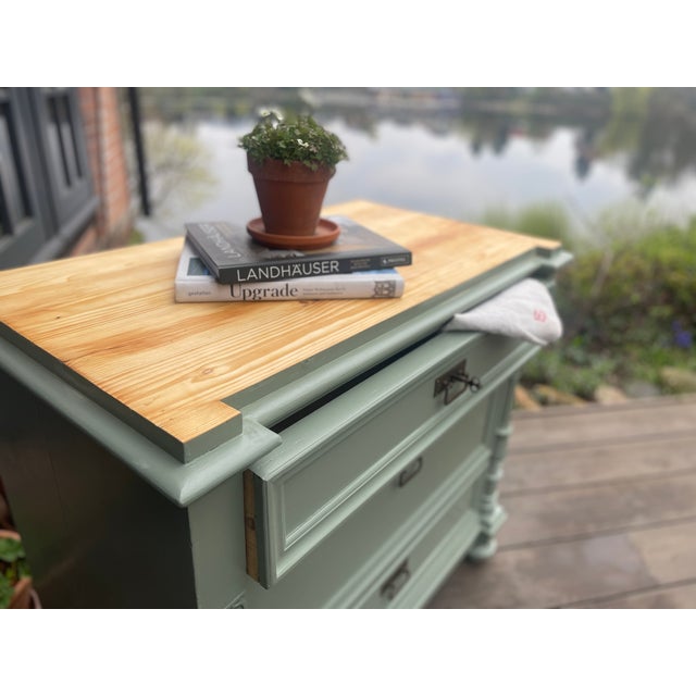 This charming antique chest of drawers has been repainted by us; the surface has been sanded and oiled. The interior has...