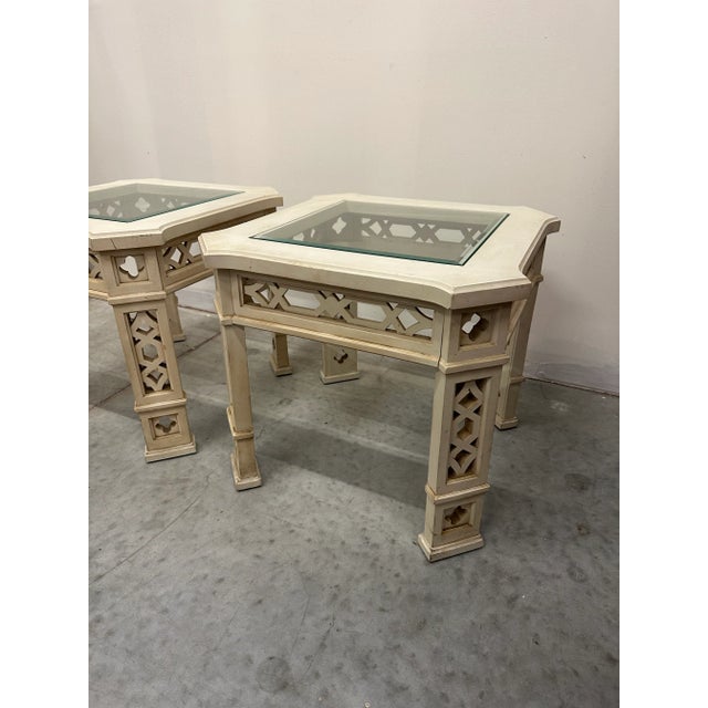 Fabulous pair of Hollywood Regency Chinese Chippendale fretwork tables. Wood tables with removable glass. These pretties...