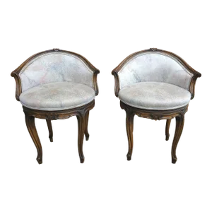 Pair Régence Style Fruitwood and Upholstered Swivel Bergere Chairs